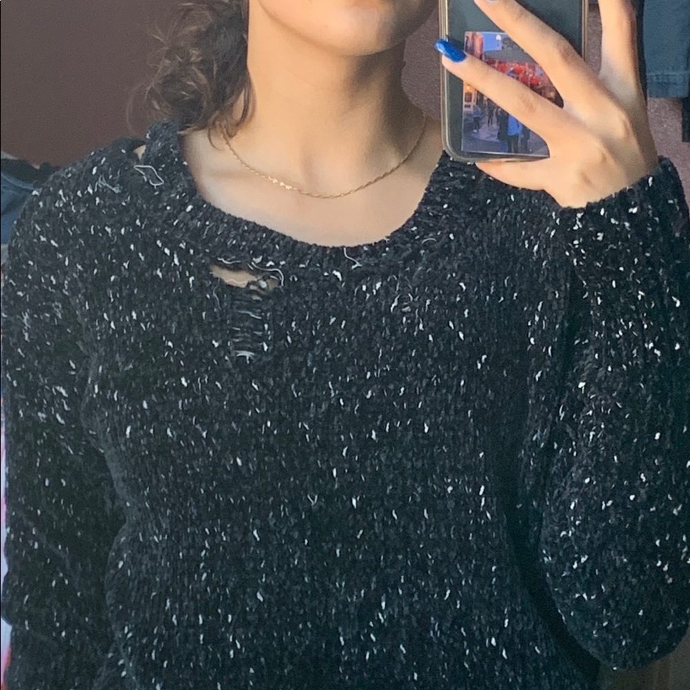 Distressed knit sweater